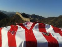 A great football team in the Great Wall of China.