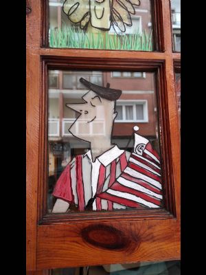 Ventana del bar Calero pintada