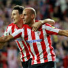Mikel Rico celebra un gol junto a Aduriz