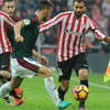 Balenziaga y Muniain durante un lance ante Osasuna