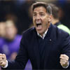 Eduardo Berizzo celebrando un gol en el banqullo del Sevilla