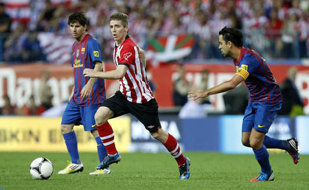 Muniain en un lance contra el FC Barcelona